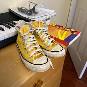 Yellow high top converse